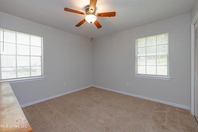 828 Briarwood Dr, Jackson, MS 39211 - spare room with light colored carpet, plenty of natural light, and baseboards