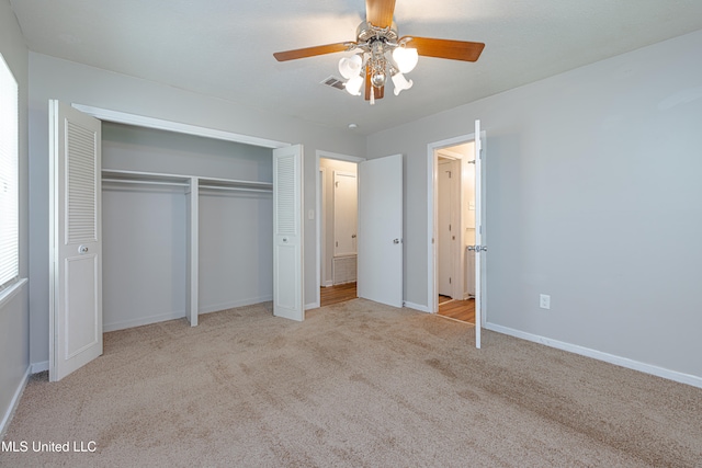 828 Briarwood Dr, Jackson, MS 39211 - unfurnished bedroom with carpet, baseboards, a closet, and ceiling fan