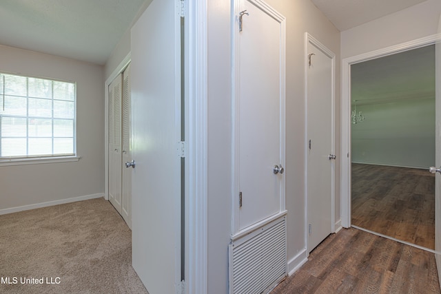 828 Briarwood Dr, Jackson, MS 39211 - corridor with baseboards and wood finished floors