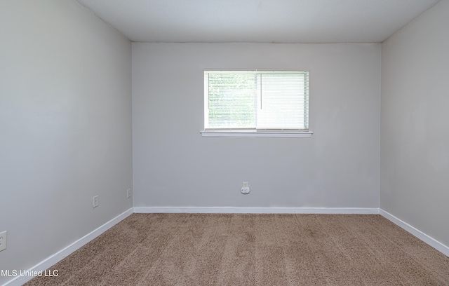 828 Briarwood Dr, Jackson, MS 39211 - empty room with carpet floors and baseboards