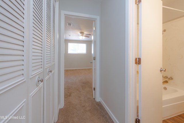 828 Briarwood Dr, Jackson, MS 39211 - hallway with carpet flooring and baseboards