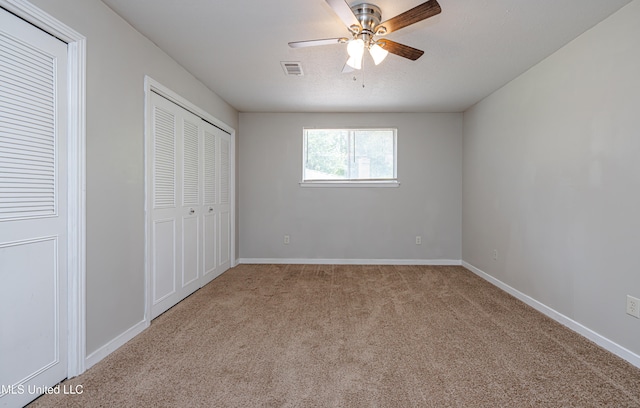 828 Briarwood Dr, Jackson, MS 39211 - unfurnished bedroom with carpet, baseboards, and a ceiling fan