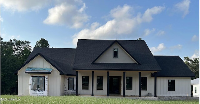 17759 Dogwood Cv, Biloxi, MS 39532 - modern farmhouse style home with a porch, board and batten siding, and a shingled roof