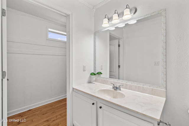 1914 Twin Pine Dr, Pearl, MS 39208 - bathroom with ornamental molding, vanity, wood finished floors, and baseboards