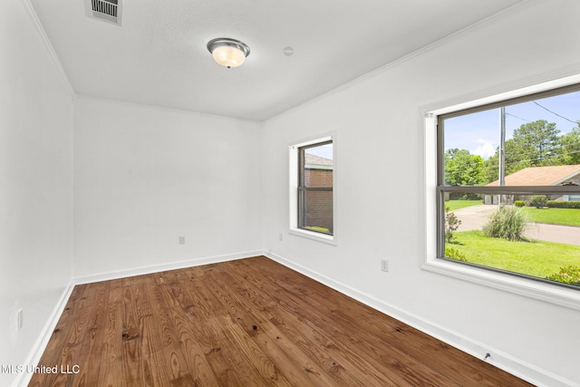 1914 Twin Pine Dr, Pearl, MS 39208 - spare room with dark wood-style flooring, baseboards, and crown molding