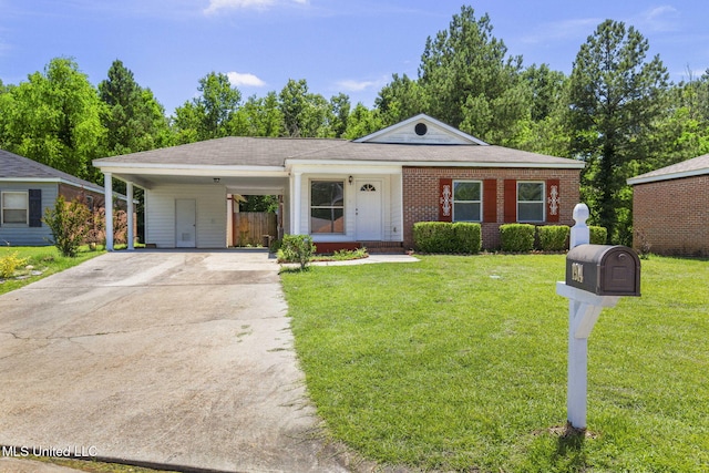 1914 Twin Pine Dr, Pearl, MS 39208 - view of front of property with driveway, a front lawn, brick siding, and a carport