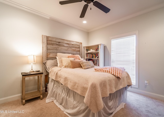 carpeted bedroom with multiple windows, ceiling fan, and crown molding