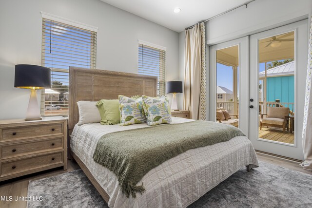 124 Arkansas Ave, Gulfport, MS 39507 - bedroom with access to outside, recessed lighting, and wood finished floors
