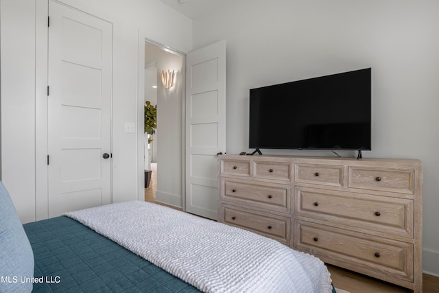 bedroom featuring hardwood / wood-style flooring