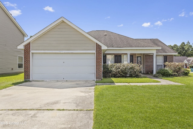 ranch-style house featuring a garage and a front lawn