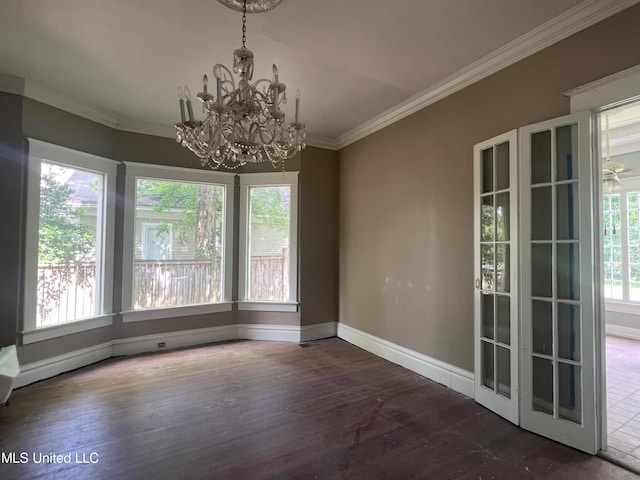 unfurnished dining area with ornamental molding, a chandelier, and dark hardwood / wood-style flooring