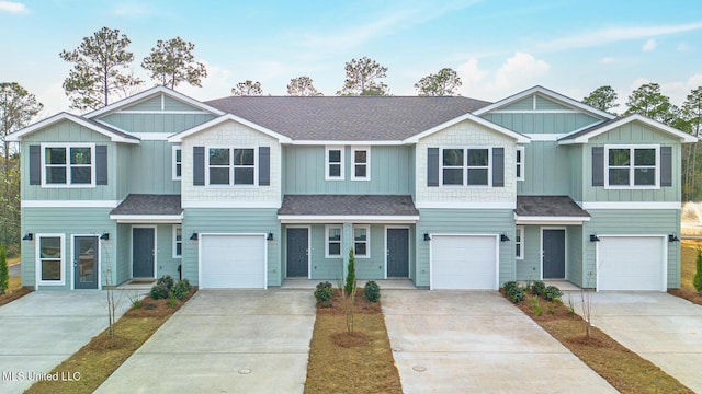 12278 Frazier Ln, Gulfport, MS 39503 - view of front of property featuring driveway, an attached garage, and a shingled roof