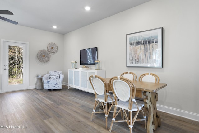 12278 Frazier Ln, Gulfport, MS 39503 - dining space with baseboards, wood finished floors, ceiling fan, and recessed lighting
