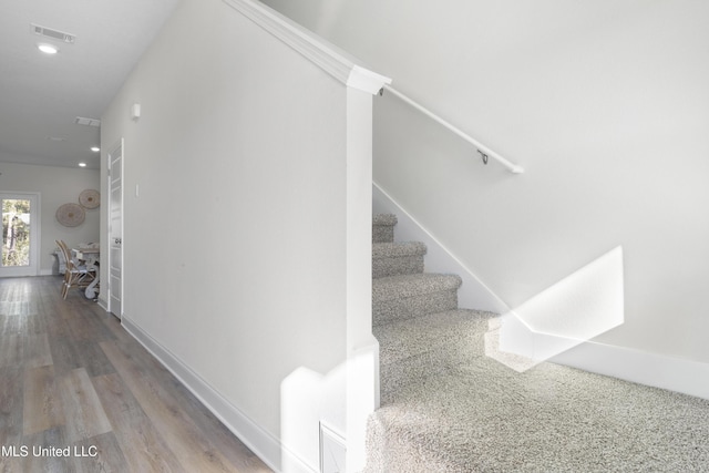 12278 Frazier Ln, Gulfport, MS 39503 - stairway with wood finished floors, recessed lighting, and baseboards