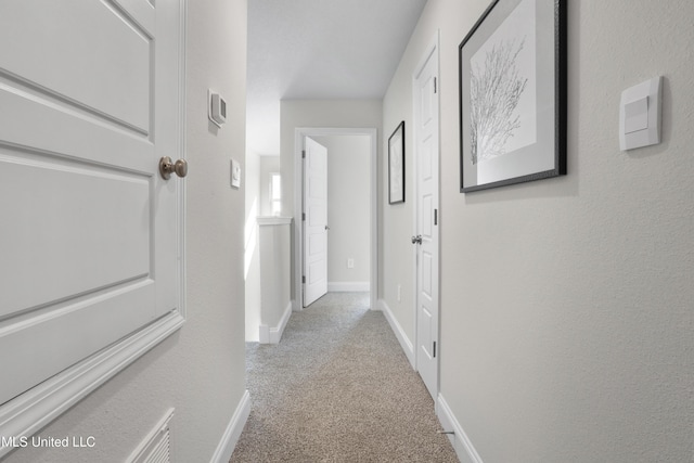 12278 Frazier Ln, Gulfport, MS 39503 - corridor featuring carpet flooring and baseboards