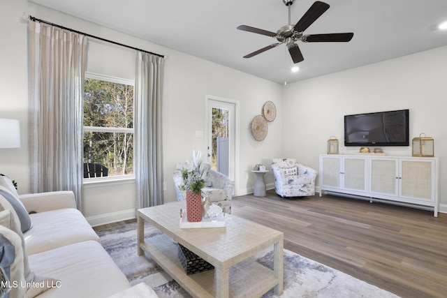 12278 Frazier Ln, Gulfport, MS 39503 - living room with wood finished floors, a ceiling fan, recessed lighting, and baseboards