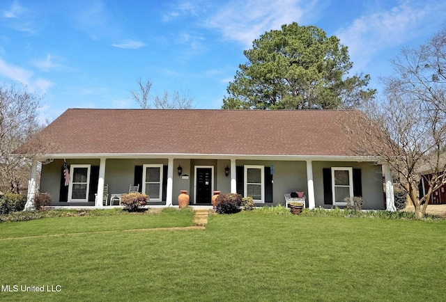 ranch-style home with covered porch, roof with shingles, a front lawn, and stucco siding