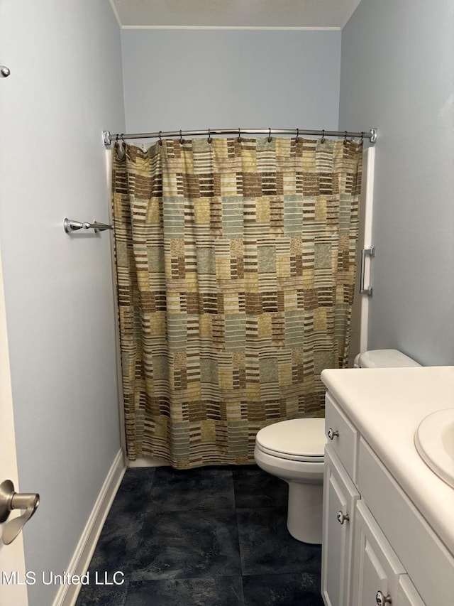 1405 Bay Ridge Dr, Gautier, MS 39553 - full bathroom featuring toilet, vanity, a shower with shower curtain, and baseboards