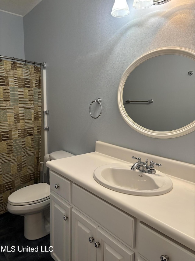 1405 Bay Ridge Dr, Gautier, MS 39553 - full bath featuring toilet, vanity, and curtained shower