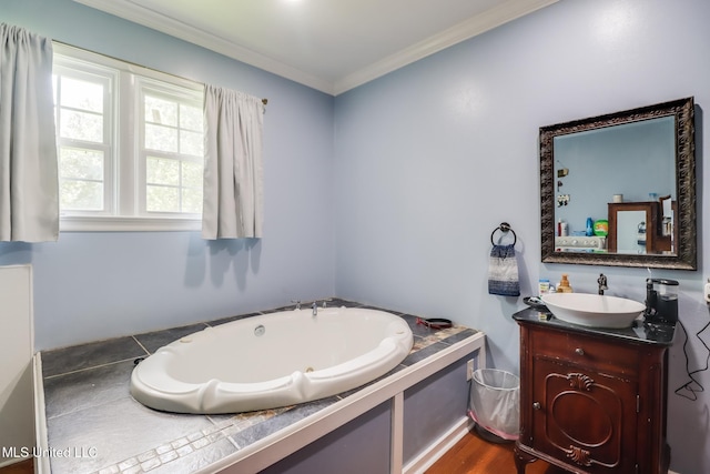 221 S Third St, Wiggins, MS 39577 - full bath featuring a tub with jets, vanity, and ornamental molding