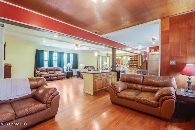 221 S Third St, Wiggins, MS 39577 - living room with light wood-style floors and ceiling fan