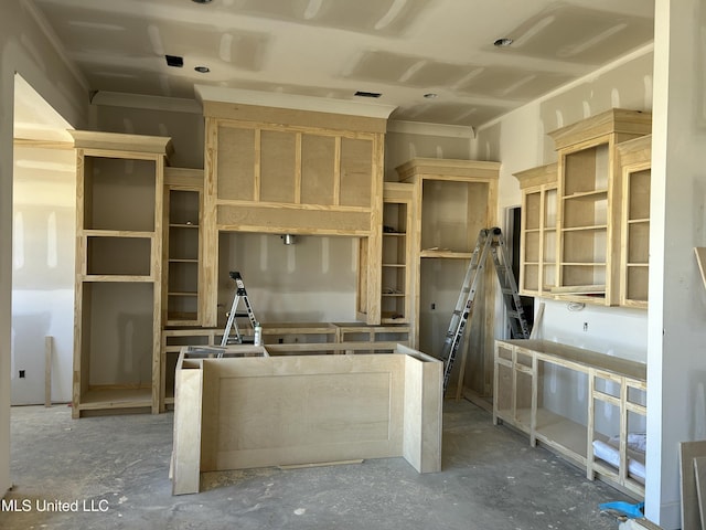 kitchen with visible vents and concrete floors