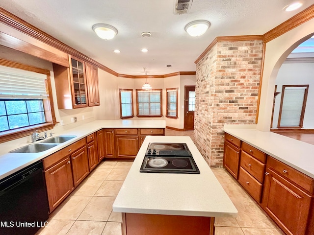 kitchen featuring ornamental molding, dishwasher, sink, and stovetop