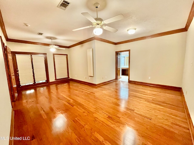 unfurnished room with crown molding, light hardwood / wood-style flooring, and ceiling fan