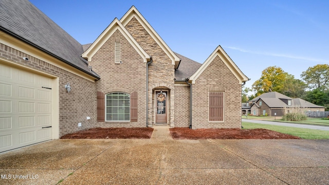 view of front of property featuring a garage