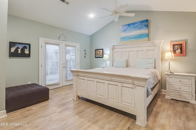 bedroom with access to exterior, french doors, light wood-type flooring, and ceiling fan