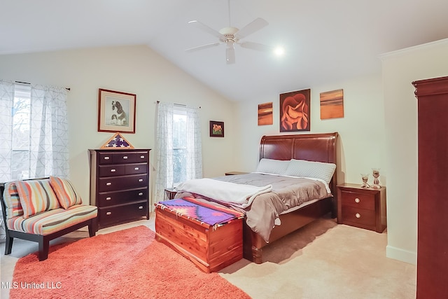 bedroom featuring ceiling fan, light carpet, and vaulted ceiling