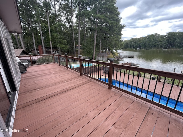 wooden deck featuring a water view