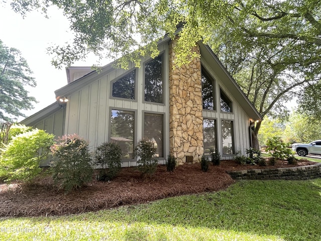 view of home's exterior featuring a yard