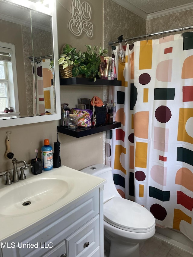 full bath featuring toilet, a shower with curtain, tile patterned flooring, crown molding, and vanity