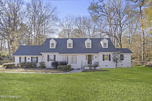 new england style home with a front lawn