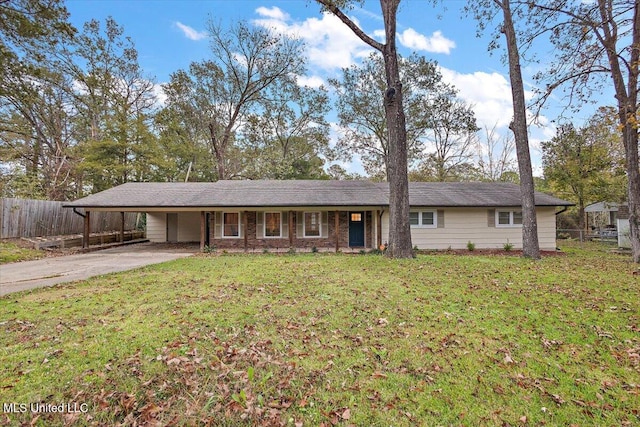 ranch-style home featuring a carport and a front yard