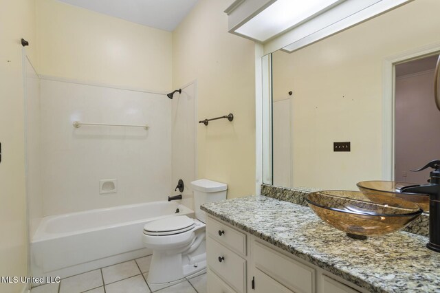 full bathroom with tile patterned flooring, toilet, vanity, and bathing tub / shower combination