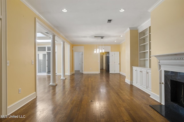 unfurnished living room with a fireplace, built in shelves, baseboards, dark wood-style flooring, and recessed lighting