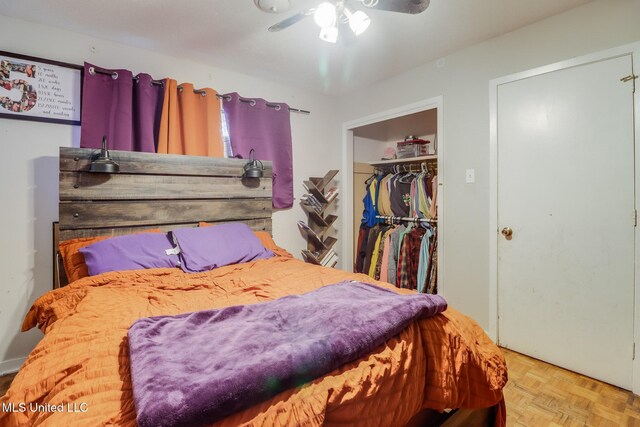 2211 Popps Ferry Rd, Biloxi, MS 39532 - bedroom featuring a closet, ceiling fan, and a spacious closet