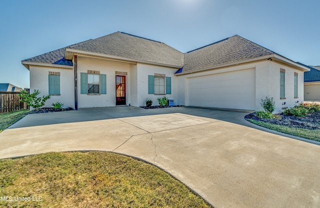 view of front of house with a garage