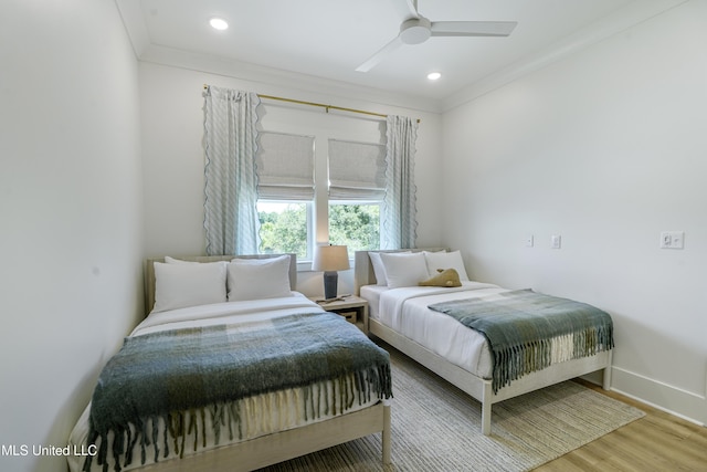 26470 W Beach Blvd, Pass Christian, MS 39571 - bedroom featuring crown molding, wood finished floors, recessed lighting, and ceiling fan