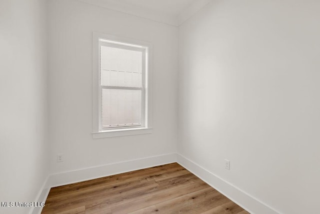 26470 W Beach Blvd, Pass Christian, MS 39571 - empty room featuring light wood-style floors and plenty of natural light