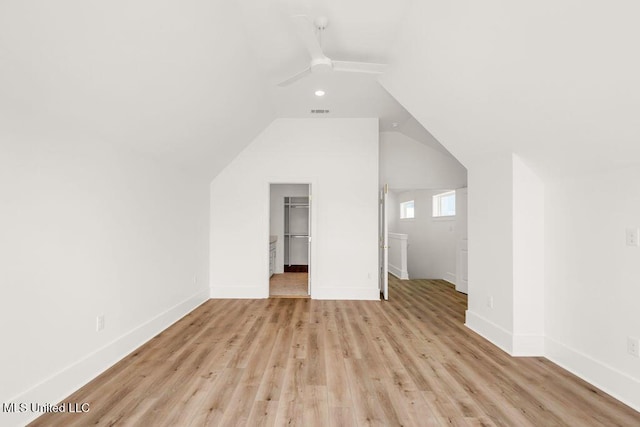 26470 W Beach Blvd, Pass Christian, MS 39571 - additional living space with lofted ceiling, light wood finished floors, and ceiling fan