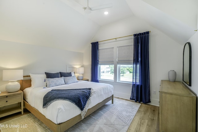26470 W Beach Blvd, Pass Christian, MS 39571 - bedroom featuring light wood finished floors and lofted ceiling