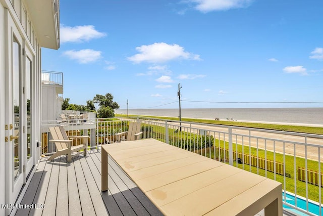 26470 W Beach Blvd, Pass Christian, MS 39571 - wooden terrace with a water view and a pool