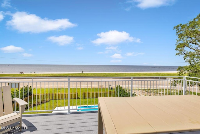 26470 W Beach Blvd, Pass Christian, MS 39571 - deck with view of water and beach and an outdoor pool