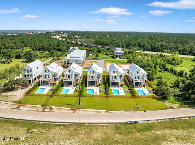 26470 W Beach Blvd, Pass Christian, MS 39571 - bird's eye view of a pool area and a forest