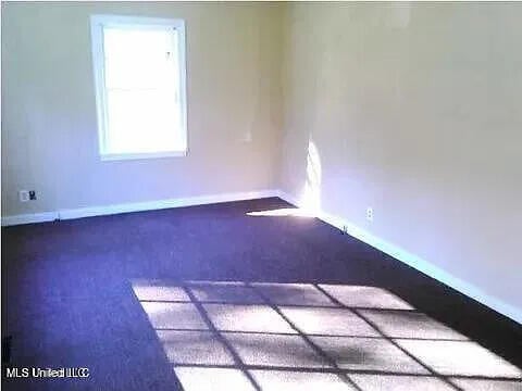 2931 Barwood Dr, Jackson, MS 39212 - spare room with baseboards
