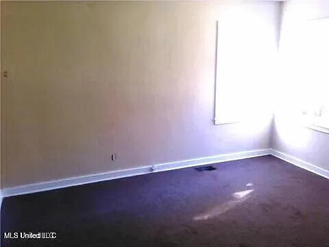 2931 Barwood Dr, Jackson, MS 39212 - empty room with baseboards