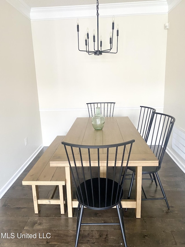 2252 Beach Dr Unit 203, Gulfport, MS 39507 - dining area with a chandelier, dark wood-style floors, and crown molding